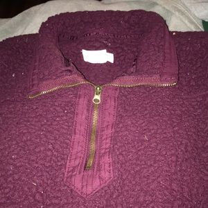 half zip up, soft fur, ive only had it for a year.